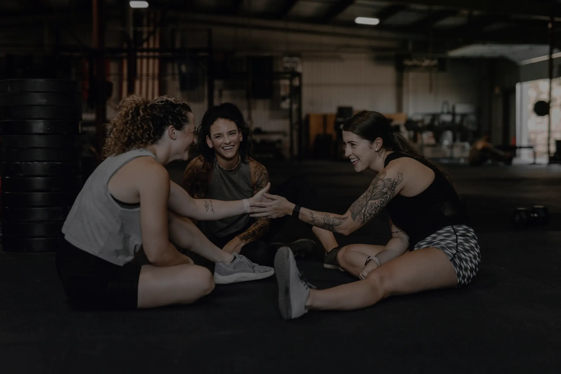 Women supporting each other after a workout